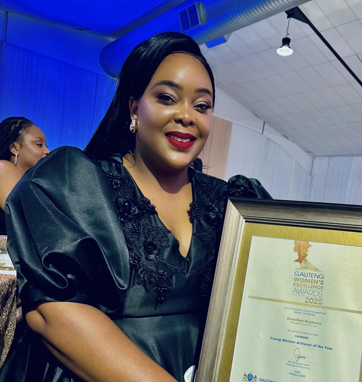 Keneilwe Raphesu accepting the Gauteng Women's Excellence Award 2025